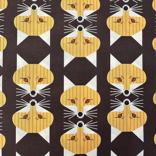 Close up of Fox Face Raisin Poplin Fabric by Charley Harper for Birch Fabrics, featuring fox face print