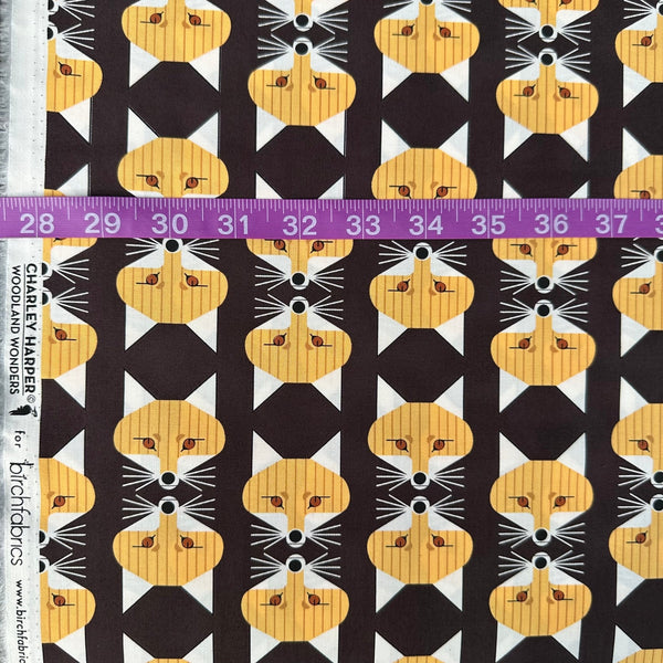 Scale of Fox Face Raisin Poplin Fabric by Charley Harper for Birch Fabrics, featuring fox face print