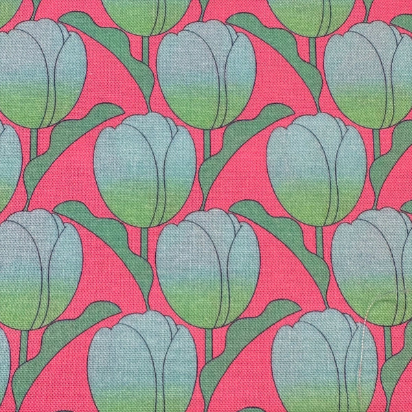 Close up of Tulip cotton fabric by Nora in pink aqua, fat quarter