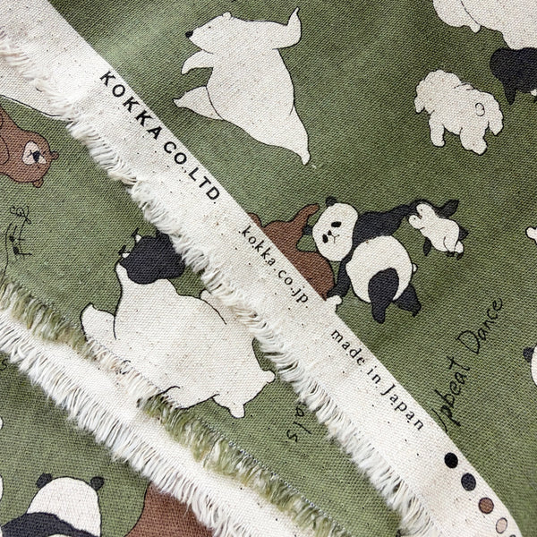 Selvage of Funny Animals Bears and Friends cotton linen canvas fabric by Kokka in green, YKA-46030-1C