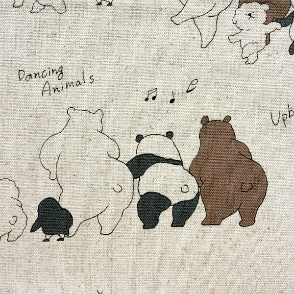 Close up of Funny Animals Bears and Friends cotton linen canvas fabric by Kokka in natural, YKA-46030-1A