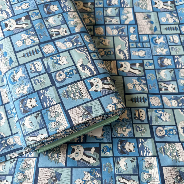Bolt of Funny Cats Woodblock Print cotton fabric by Kokka in blue, style YKA-41060 1C
