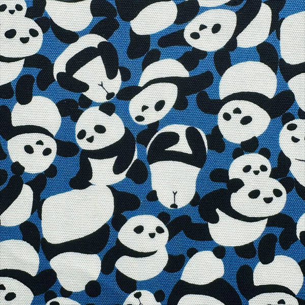 Close up of Packed Pandas cotton oxford fabric in blue by Fuwari, Japanese import with allover panda print