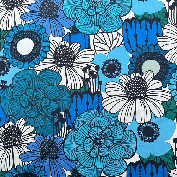 Garden Flowers cotton fabric by Kokka featuring oversized blue and black florals in a Scandinavian-inspired design