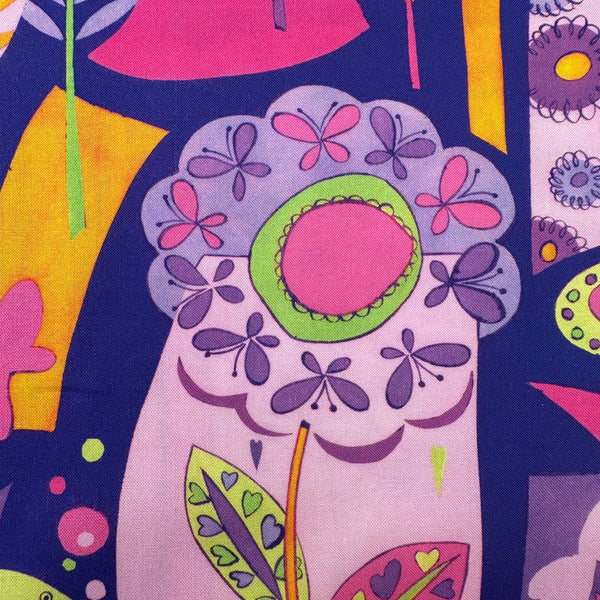 Close up of Geometry cotton fabric in White Multi by Nora featuring a brightly colored floral and landscape design with a geometric style
