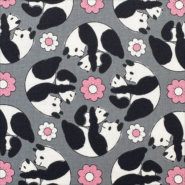 Close up of Goro Koro Panda Cotton Oxford Fabric in Gray by Anyan for Cotorienne and Yuwa featuring adorable rolling pandas on a gray background.