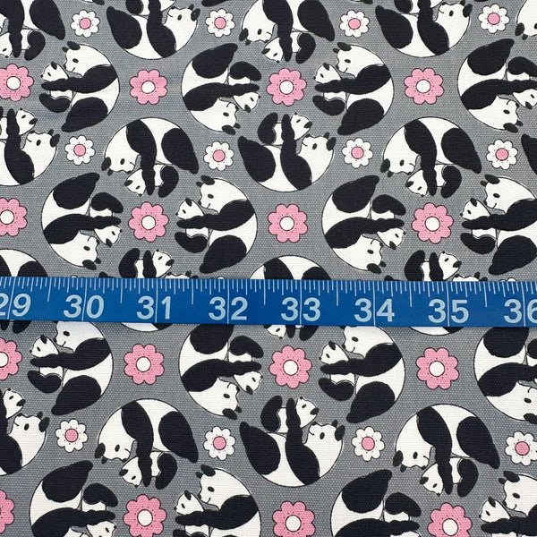 Scale of Goro Koro Panda Cotton Oxford Fabric in Gray by Anyan for Cotorienne and Yuwa featuring adorable rolling pandas on a gray background.