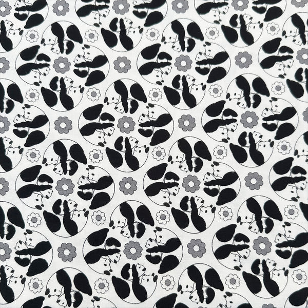 Goro Koro Panda Cotton Oxford Fabric in White by Anyan for Cotorienne and Yuwa featuring adorable rolling pandas on a white background.