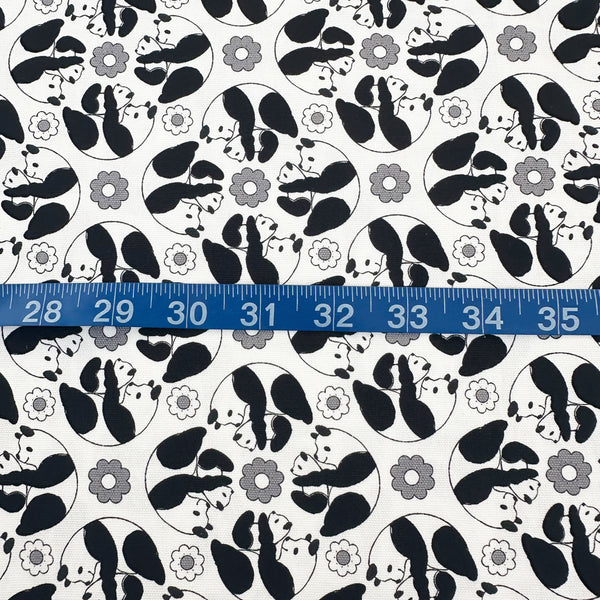 Scale of Goro Koro Panda Cotton Oxford Fabric in White by Anyan for Cotorienne and Yuwa featuring adorable rolling pandas on a white background.