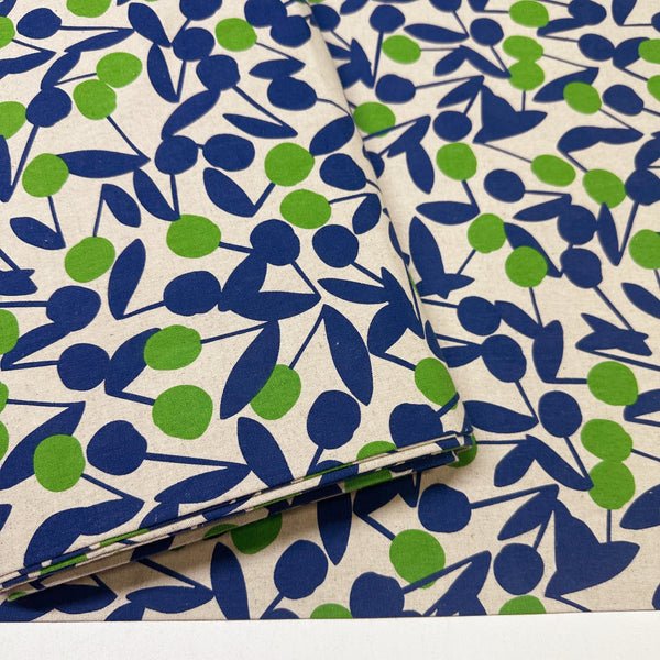 Bolt of Green Cherry Pom Pom canvas fabric by Sevenberry, cotton linen blend