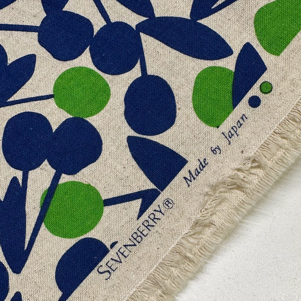 Selvage of Green Cherry Pom Pom canvas fabric by Sevenberry, cotton linen blend