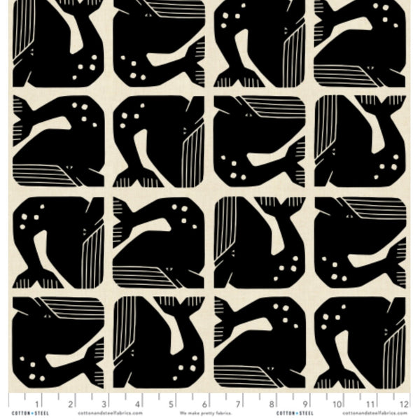 Scale of Grumpy Whale cotton fabric by Loes van Oosten featuring stylized black whale print on unbleached cotton fabric