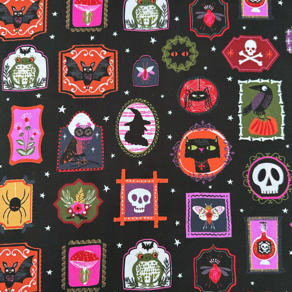 Hocus Pocus Ghoulish Gallery cotton fabric by Helen Black featuring spooky framed portraits on a black background