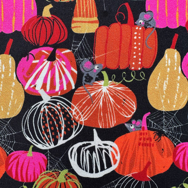Close up of Hocus Pocus Pumpkin Patch cotton fabric by Helen Black featuring charming pumpkins and cute mice on a black background