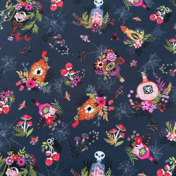 Hocus Pocus Spellbound cotton fabric by Helen Black featuring potion bottles, spider webs, and mushrooms on a black background