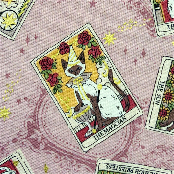 Close up of In the Darkness Tarot Cats cotton fabric by Kokka in mauve, YGA-91050 B