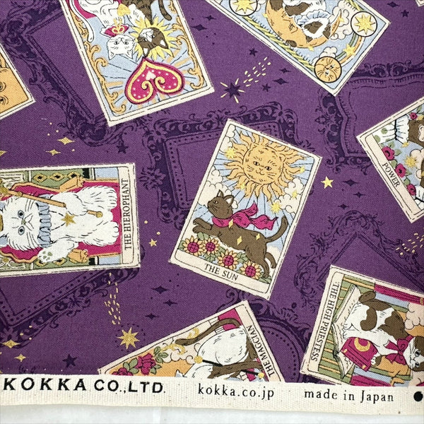 Selvage of In the Darkness Tarot Cats cotton fabric by Kokka in purple, YGA-91050 C
