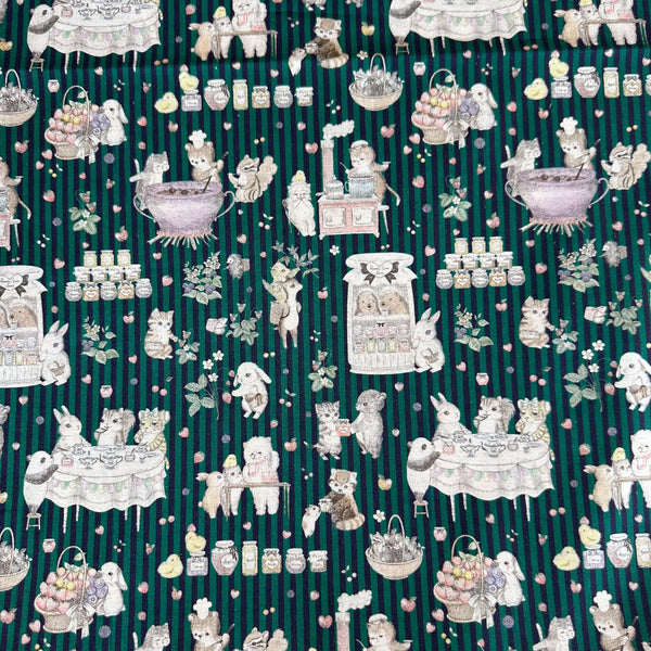 Jam Lab cotton linen fabric by Yukiemon for Hokkoh featuring a whimsical critter tea party with animals making jam on a green striped background, imported from Japan