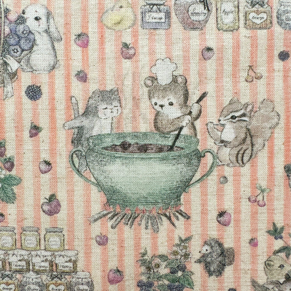 Close up of Jam Lab cotton linen fabric by Yukiemon for Hokkoh featuring a whimsical critter tea party with animals making jam on a pink striped background, imported from Japan