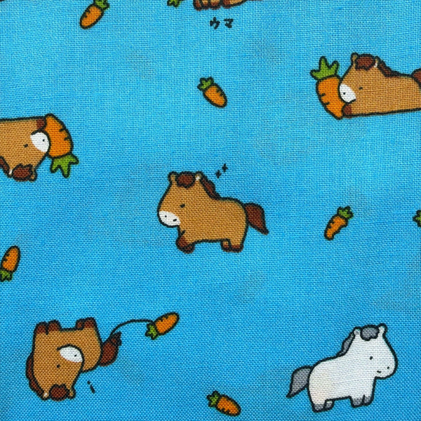 Close up of Kawaii Horses cotton fabric by Cosmo Textiles in sky blue, AP55104 1D