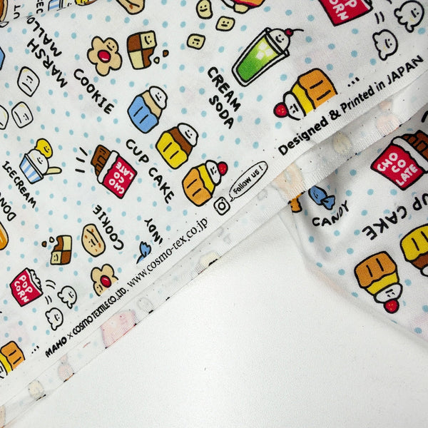 Selvage of Kawaii Snack Time cotton fabric by Cosmo Textiles in white, AP1906 1A