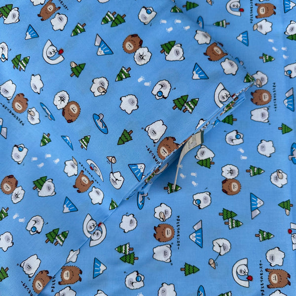 Bolt of Kawaii Yeti Cotton Fabric by Cosmo Textiles, style AP65105 2C, featuring yeti illustrations, in blue