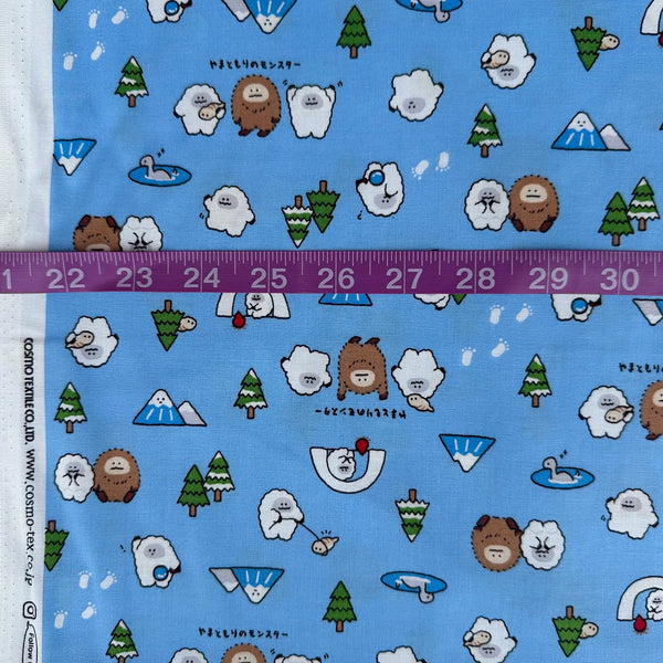 Scale of Kawaii Yeti Cotton Fabric by Cosmo Textiles, style AP65105 2C, featuring yeti illustrations, in blue