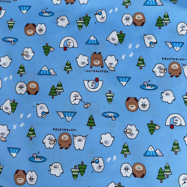 Kawaii Yeti Cotton Fabric by Cosmo Textiles, style AP65105 2C, featuring yeti illustrations, in blue