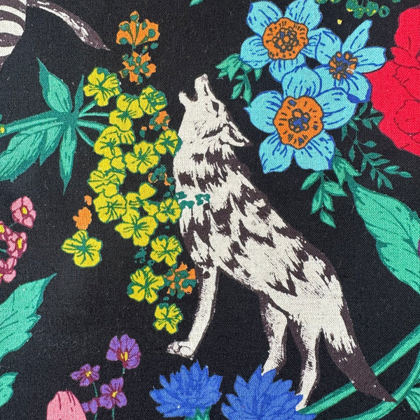 Close-up of Echino Wonder print detail by Kokka in Black/Multi
