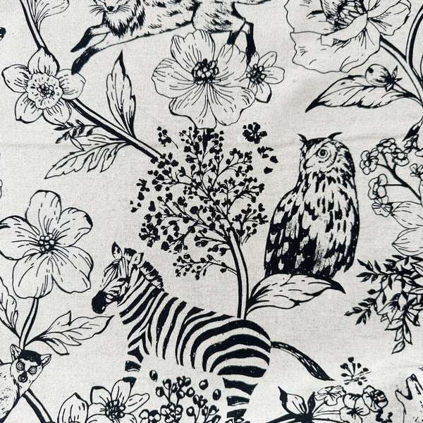 Close-up of Echino Wonder print detail by Kokka in Natural/Black