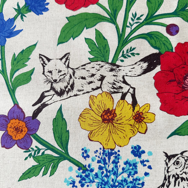 Close-up of Echino Wonder print detail by Kokka in Natural/Multi