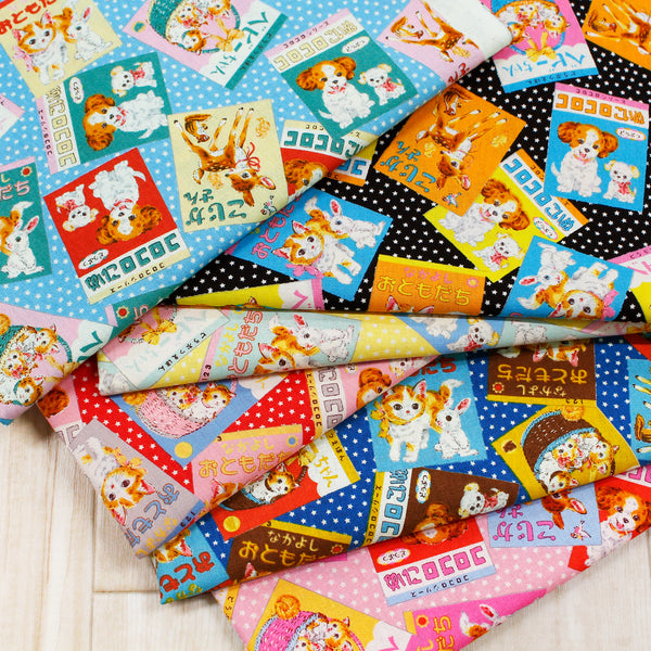 Colors of KoroKoro Animal Picture Books Cotton Fabric in Pink by Koko Seki – quilt-weight cotton with retro animal storybook designs and Japanese text