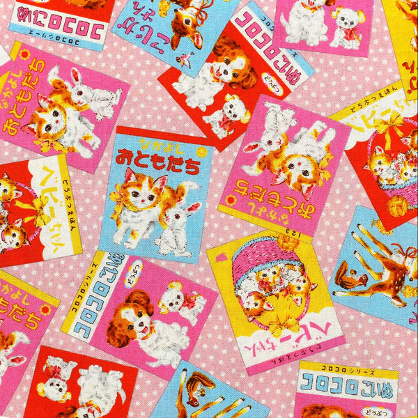 KoroKoro Animal Picture Books Cotton Fabric in Pink by Koko Seki – quilt-weight cotton with retro animal storybook designs and Japanese text