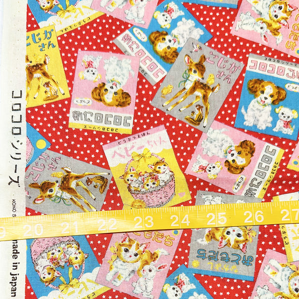 Scale of KoroKoro Animal Picture Books Cotton Fabric in Red by Koko Seki – quilt-weight cotton with retro animal storybook designs and Japanese text