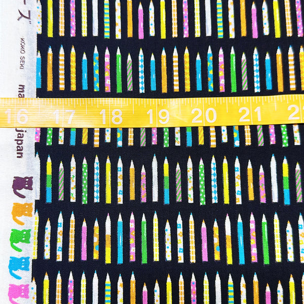 Scale of KoroKoro Pencils Cotton Fabric in Black by Koko Seki – quilt-weight cotton with coordinating pencil design for the KoroKoro Animal Picture Books collection