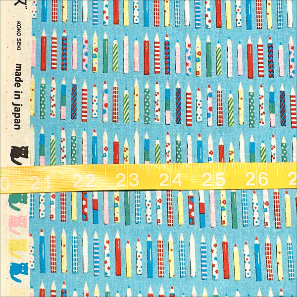 Scale of KoroKoro Pencils Cotton Fabric in Light Blue by Koko Seki – quilt-weight cotton with coordinating pencil design for the KoroKoro Animal Picture Books collection