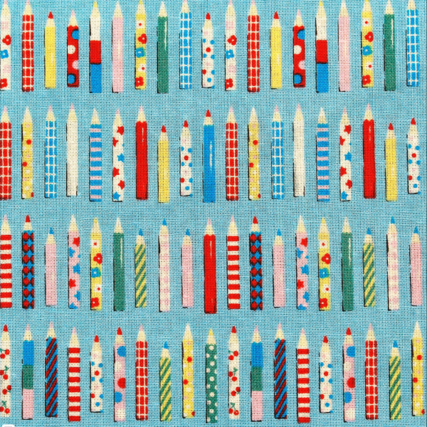 KoroKoro Pencils Cotton Fabric in Light Blue by Koko Seki – quilt-weight cotton with coordinating pencil design for the KoroKoro Animal Picture Books collection
