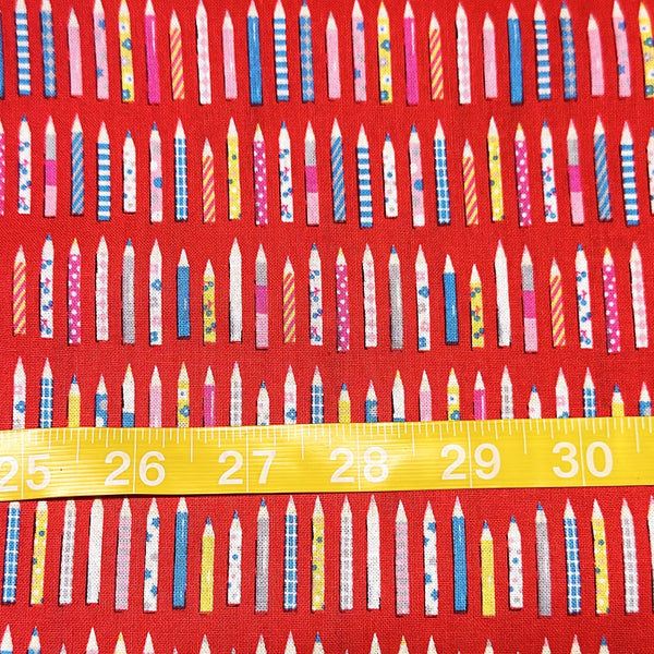 Scale of KoroKoro Pencils Cotton Fabric in Red by Koko Seki – quilt-weight cotton with coordinating pencil design for the KoroKoro Animal Picture Books collection