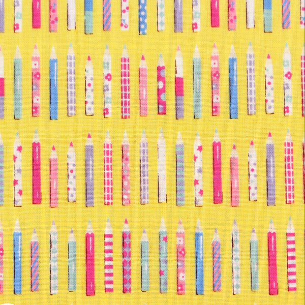 KoroKoro Pencils Cotton Fabric in Yellow by Koko Seki – quilt-weight cotton with coordinating pencil design for the KoroKoro Animal Picture Books collection