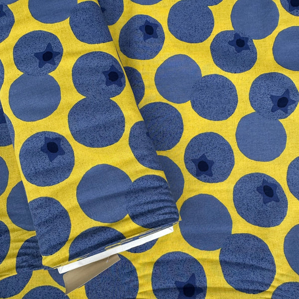 Bolt of Large Blueberries Cotton Linen Blend Fabric by Cosmo Textiles, style AP65204 1C, featuring oversized blueberries, in yellow