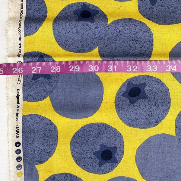 Scale of Large Blueberries Cotton Linen Blend Fabric by Cosmo Textiles, style AP65204 1C, featuring oversized blueberries, in yellow