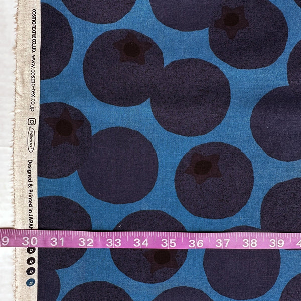 Scale of Large Blueberries Cotton Linen Blend Fabric by Cosmo Textiles, style AP65204 1E, featuring oversized blueberries, in blue