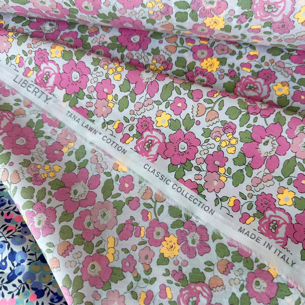 Selvage detail of Liberty Fabrics Betsy Tana Lawn fabric, Pink Light Neon colorway