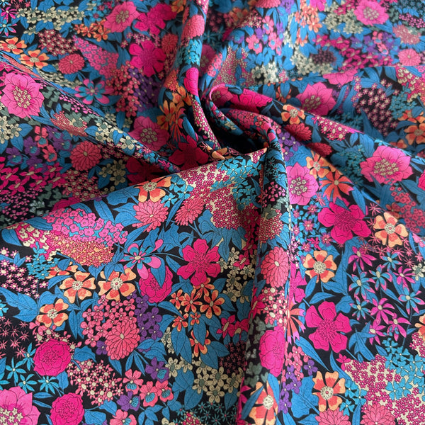 Ciara Tana Lawn fabric by Liberty Fabrics shown draped, Pink