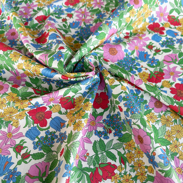 Clarabell Tana Lawn fabric by Liberty Fabrics shown draped, Multi Bright