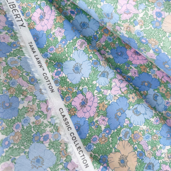 Selvage detail of Liberty Fabrics Meadow Song Tana Lawn fabric, Blue colorway