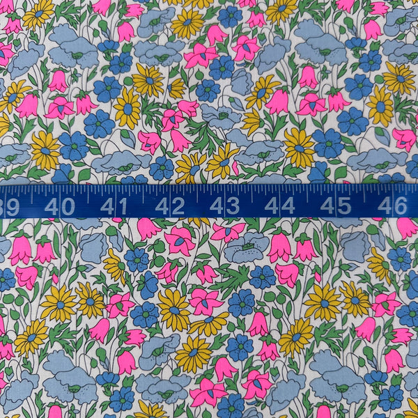 Poppy and Daisy Tana Lawn fabric by Liberty Fabrics shown with scale reference