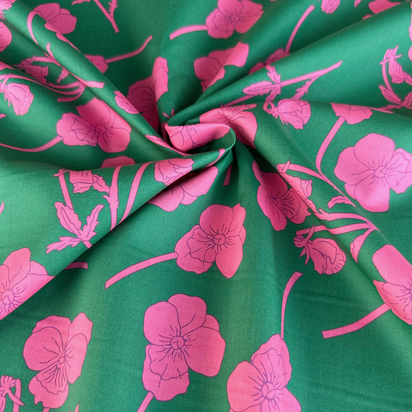 Radiant Ros Tana Lawn fabric by Liberty Fabrics shown draped, Green