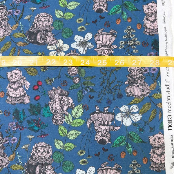 Scale of Liminal Garden Cats Cotton Fabric in Aegean Blue by Nora – whimsical cats dressed as humans in a garden setting on quilt-weight cotton