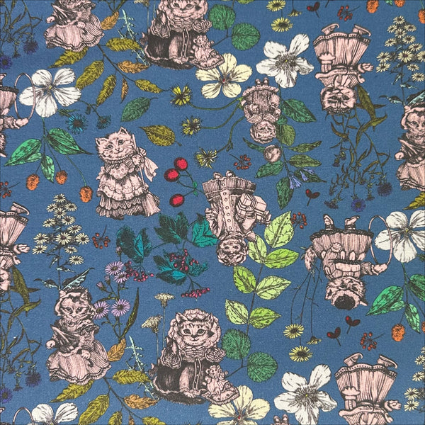 Liminal Garden Cats Cotton Fabric in Aegean Blue by Nora – whimsical cats dressed as humans in a garden setting on quilt-weight cotton